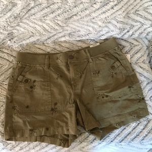 Green floral print shorts